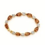 Golden Ember Pear Cut & Round Cut Cubic Zirconia Bracelet in Gold Finish