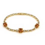 Amber Gleam Princess & Baguette-Cut Golden Stone Tennis Bracelet