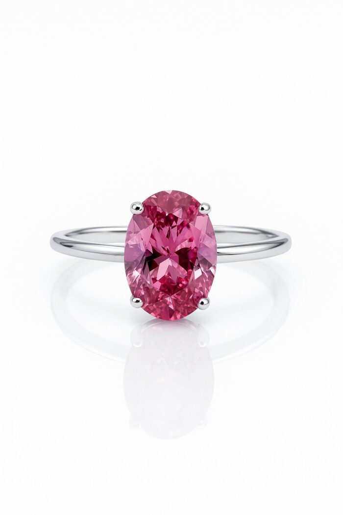 Pink Sapphire Solitaire Ring – Oval Cut Stone in Minimalist Setting - Image 1