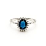 Royal Halo Ring – Oval Blue Sapphire & Cubic Zirconia Engagement Ring