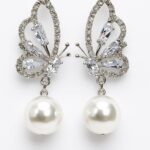 Wings of Grace – Butterfly Drop Earrings with Pear-Cut Zirconia & Round Pearl